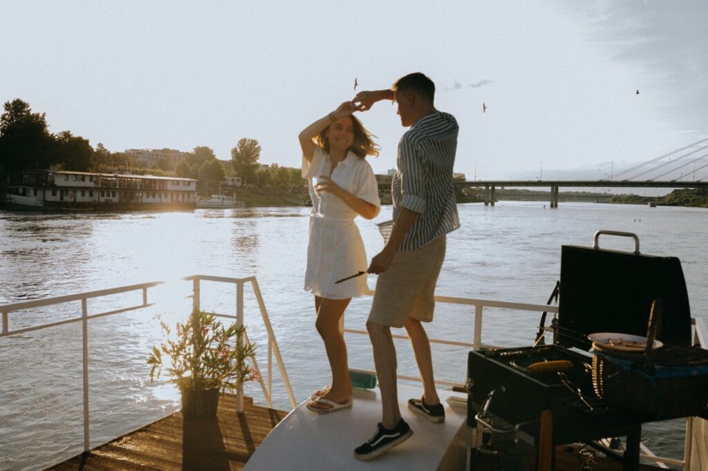 A woman who has over come negative body image and is happy dancing with her partner
