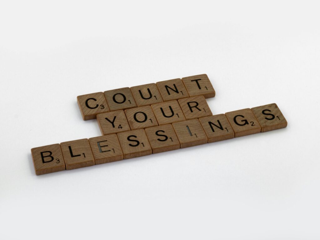 Scrabble letters: Count Your Blessings to help promote the benefits of using a gratitude list